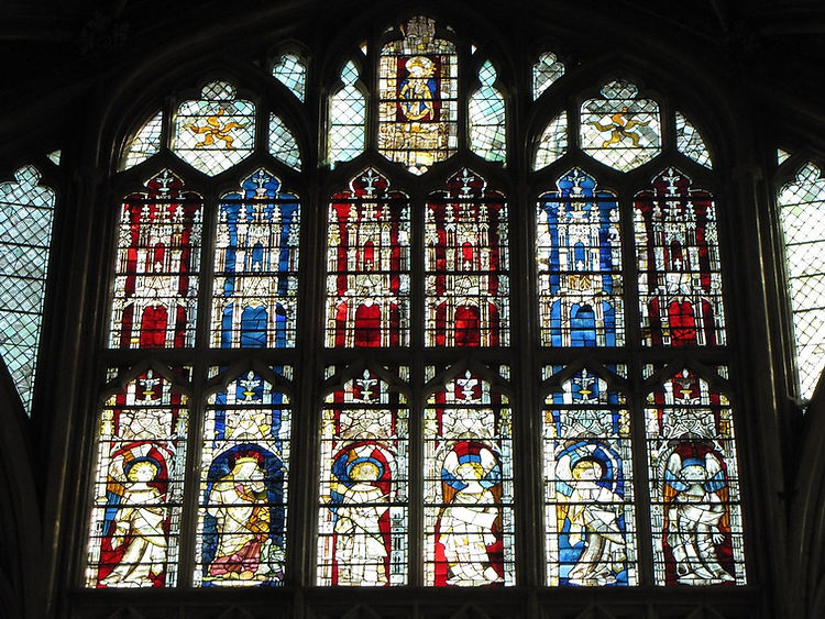 Red and blue medieval stained glass in Gloucester Cathedral