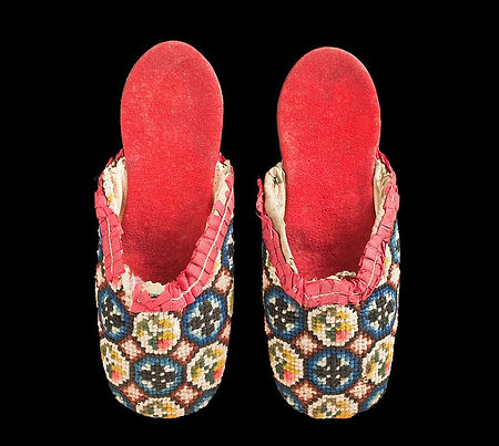 Red slippers with colourful embroidery